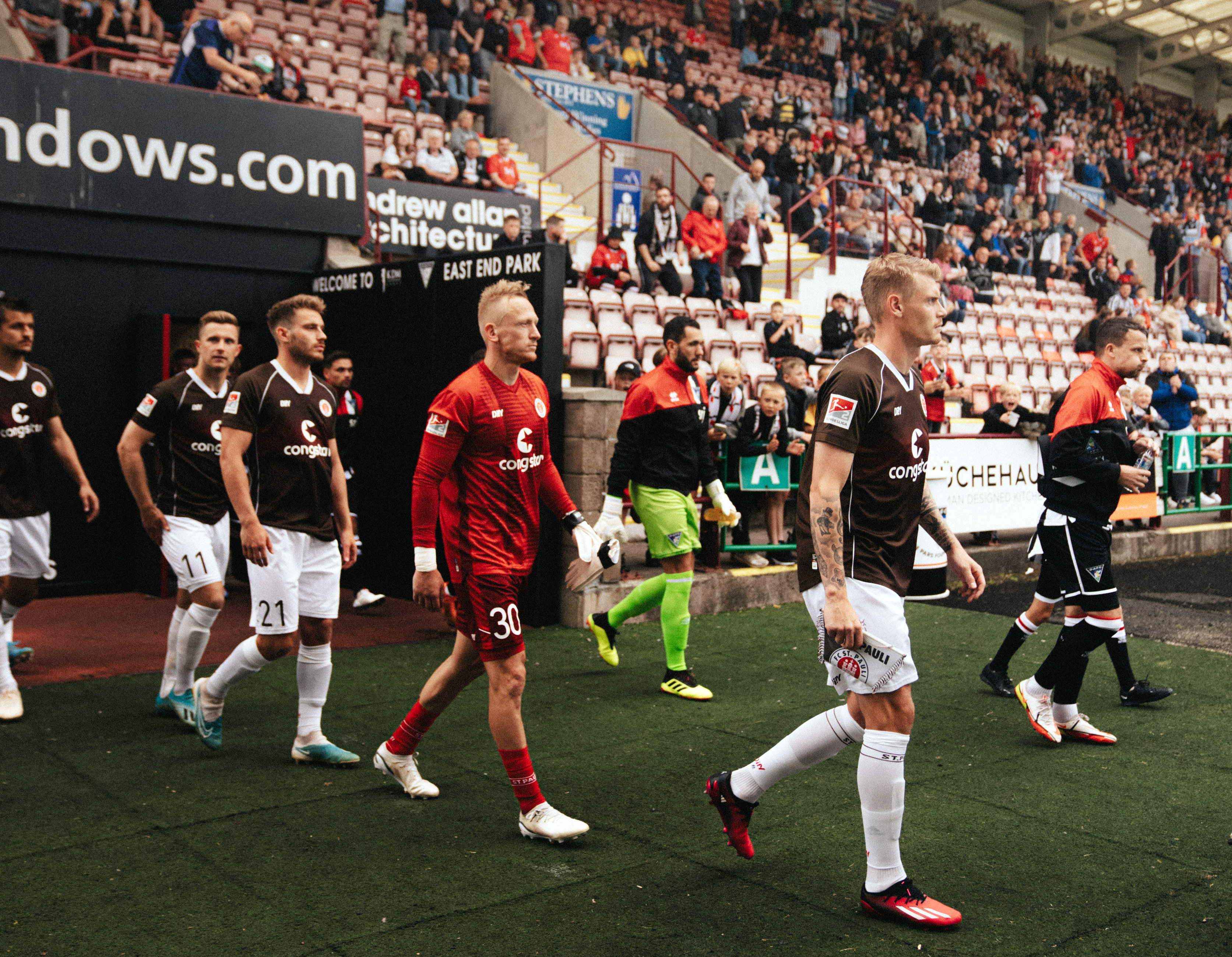 Sascha Burchert takes to the field with his teammates against Dunfermline.